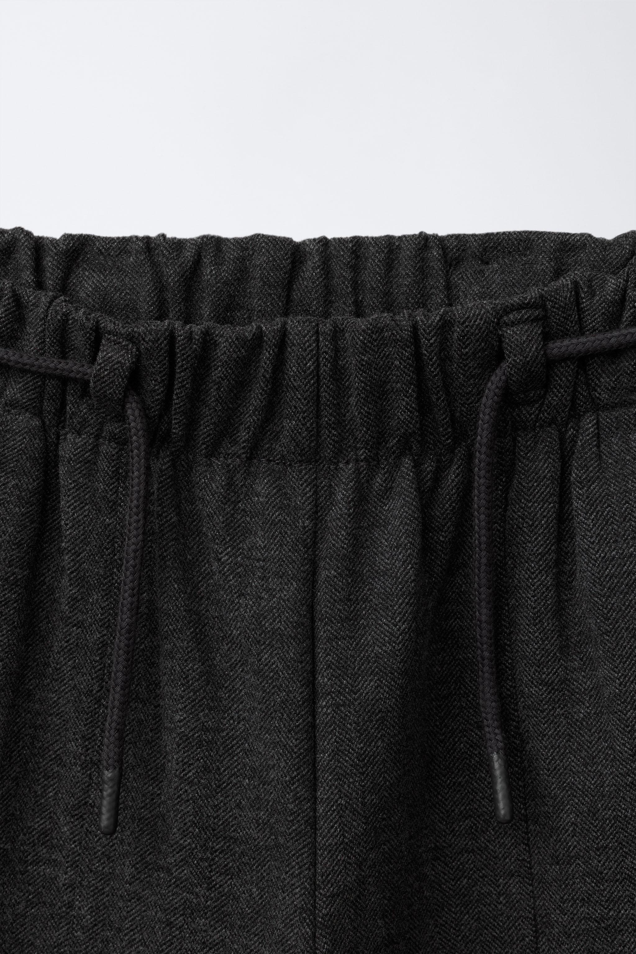 PANTALON LARGE À CHEVRONS